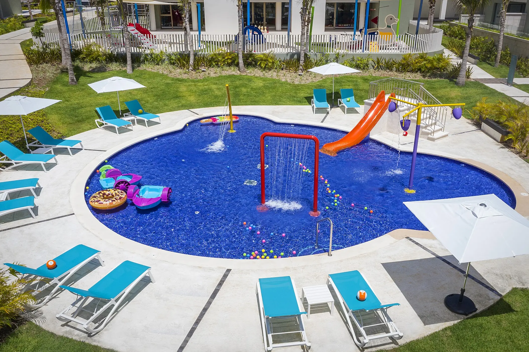 Catalonia Grand Costa Mujeres kids pool with water slide and fountains, Cancun