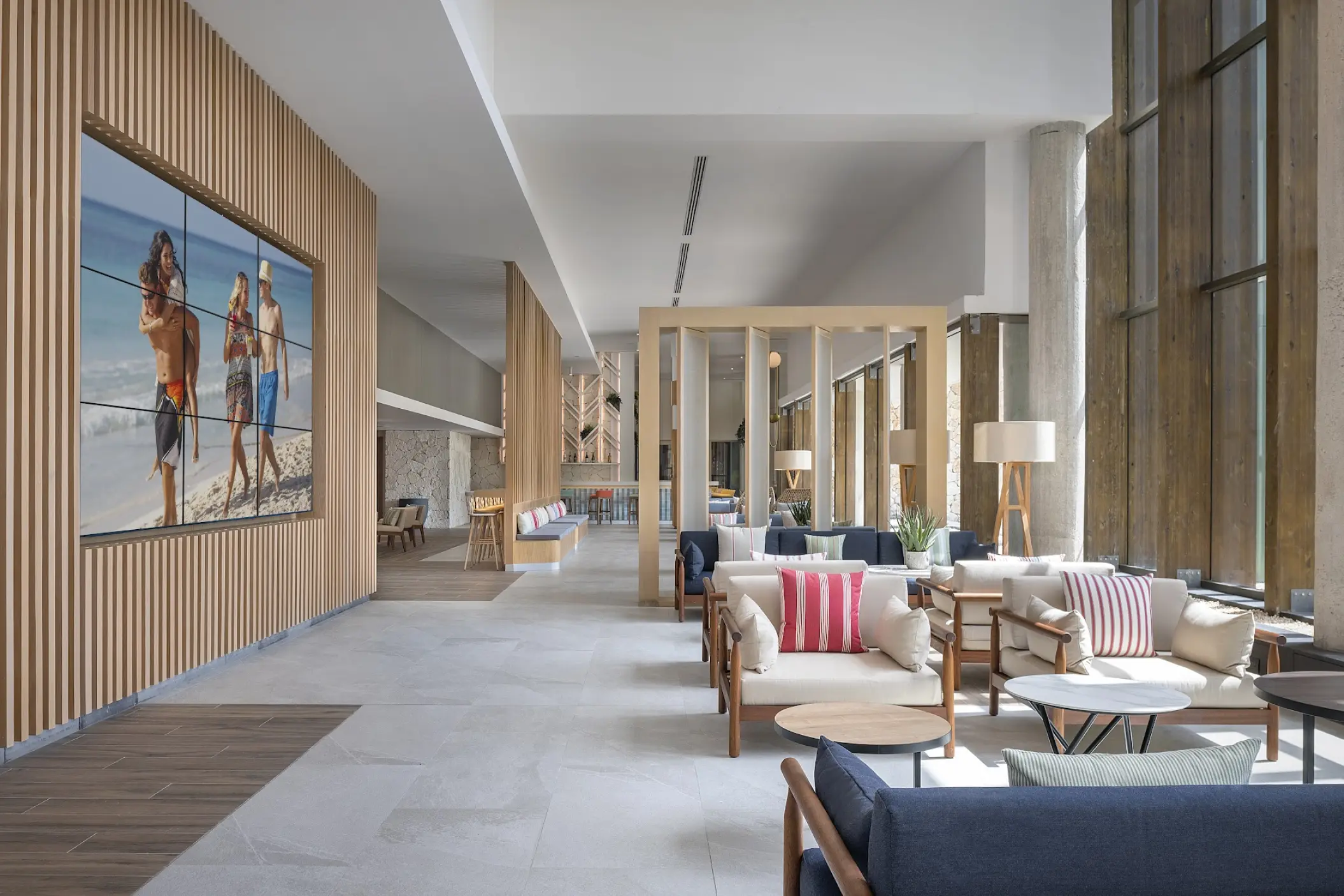 Modern open-air lobby with contemporary seating at Catalonia Grand Costa Mujeres, Cancun