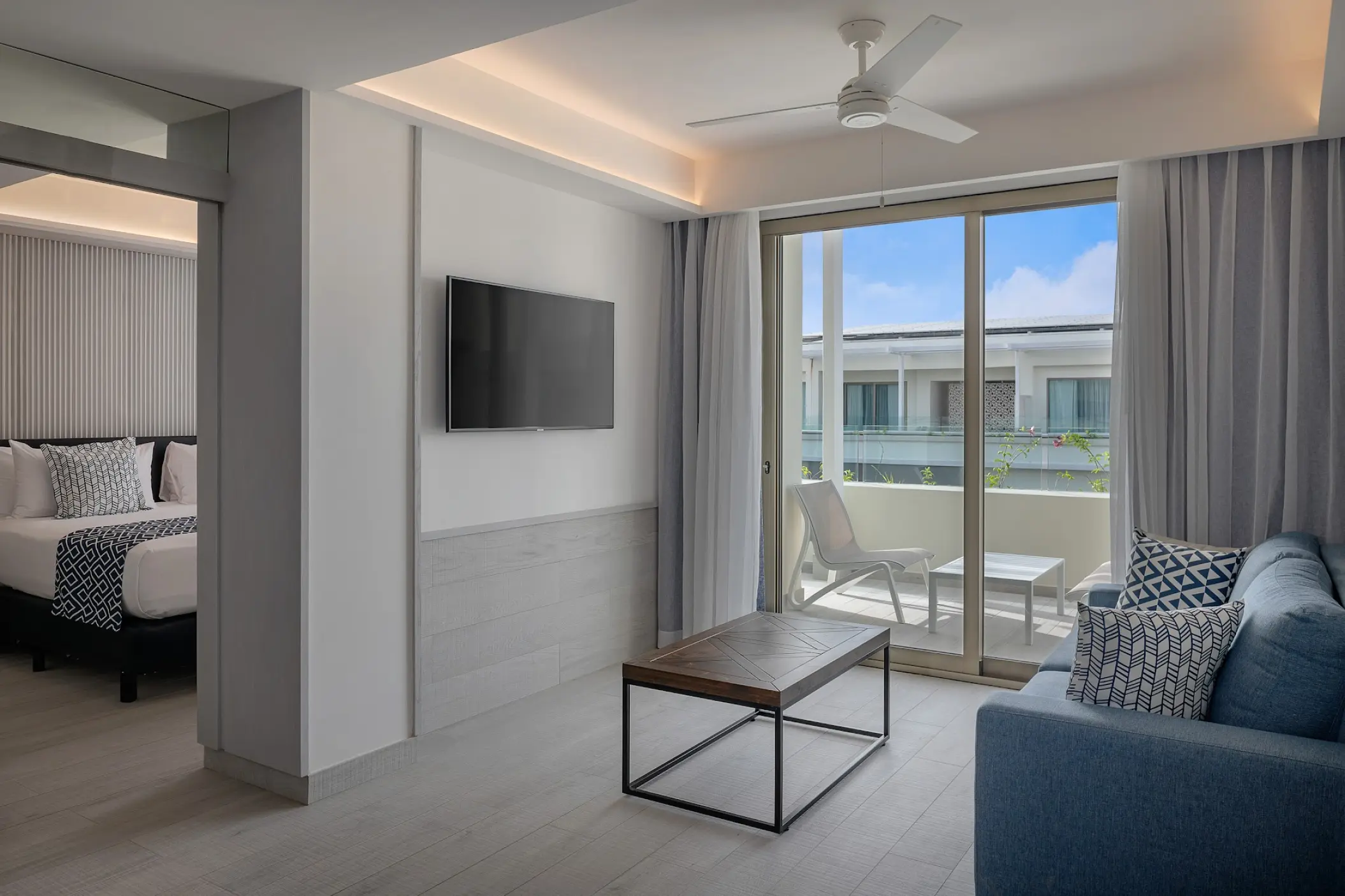 Modern suite living area and private terrace at Catalonia Grand Costa Mujeres, Cancun