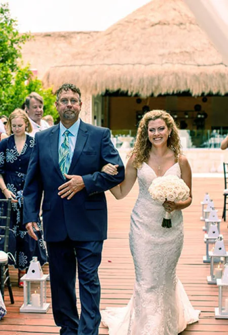 bride and dad walking down the isle