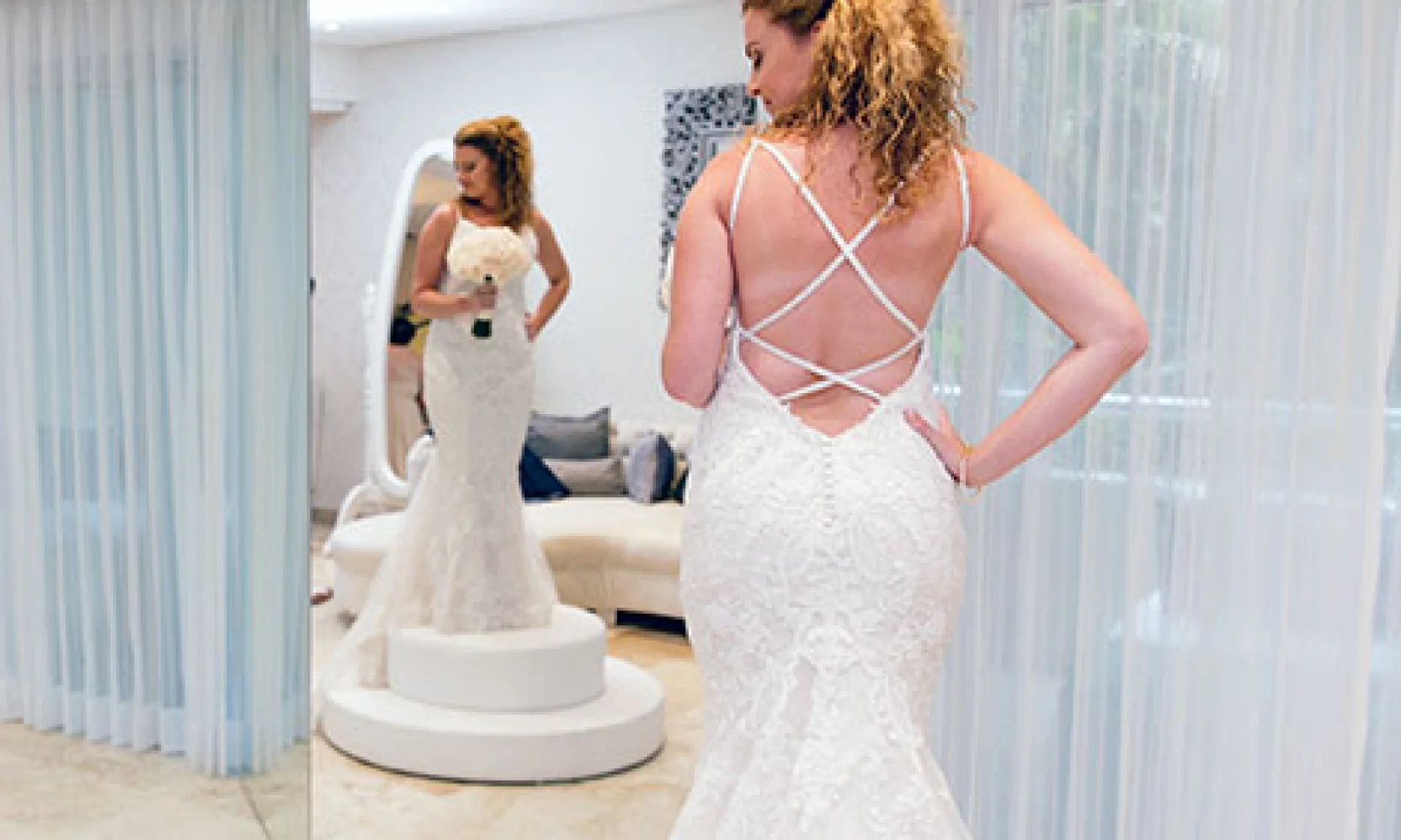 Bride wearing her dress