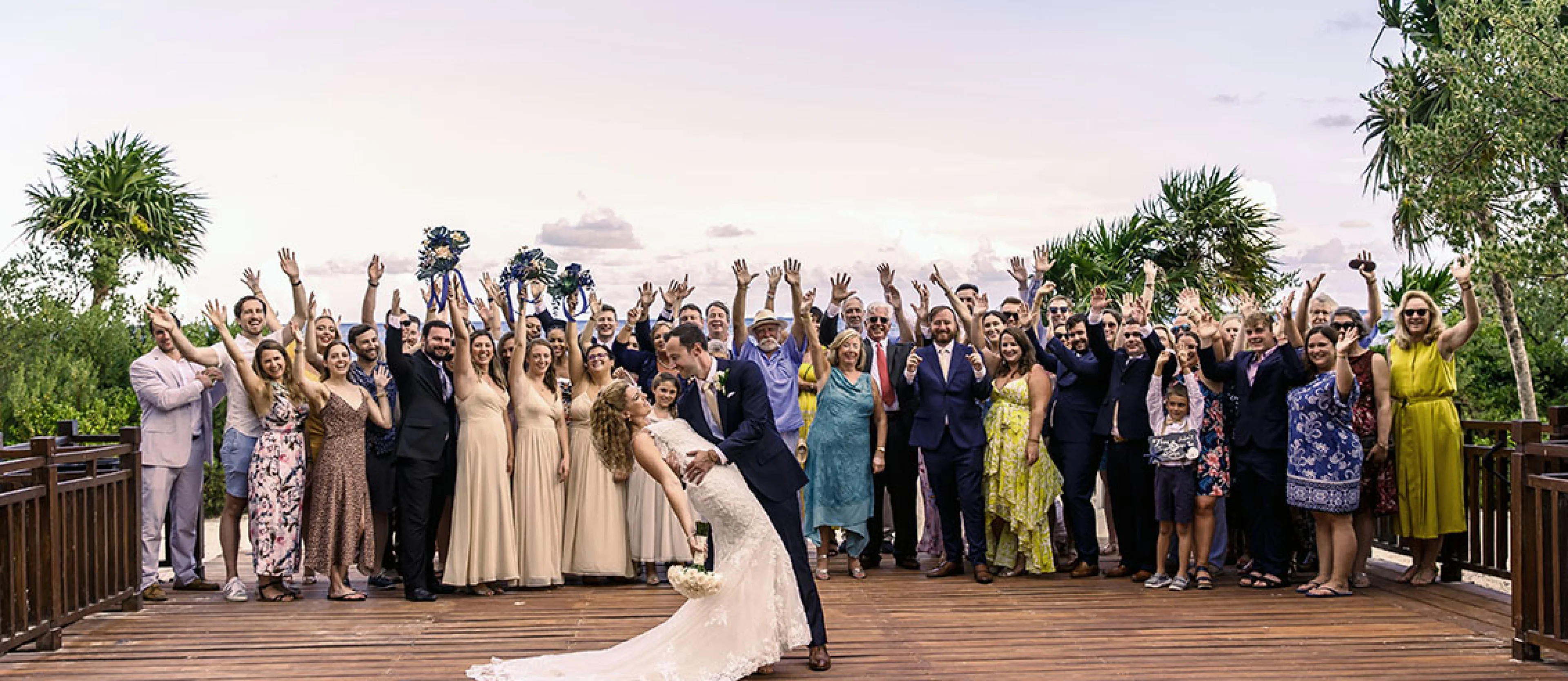 Wedding couple enjoying with their group.