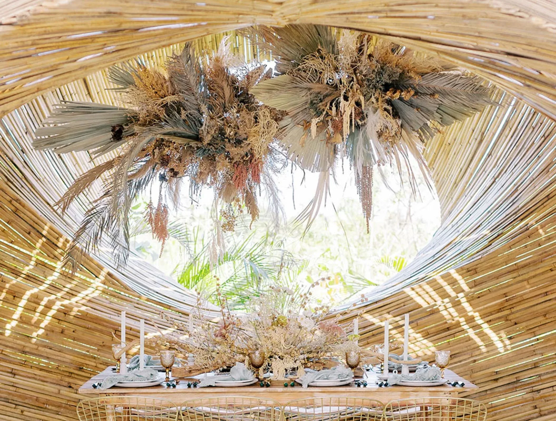 Conrad Tulum Weddings flowers and dinner setup.