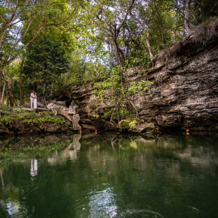 Wedding couple at cenote at El Dorado Casitas