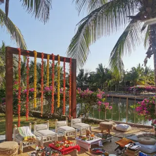 South Asian wedding ceremony setup on the garden terrace at El Dorado Casitas Royale, Riviera Maya