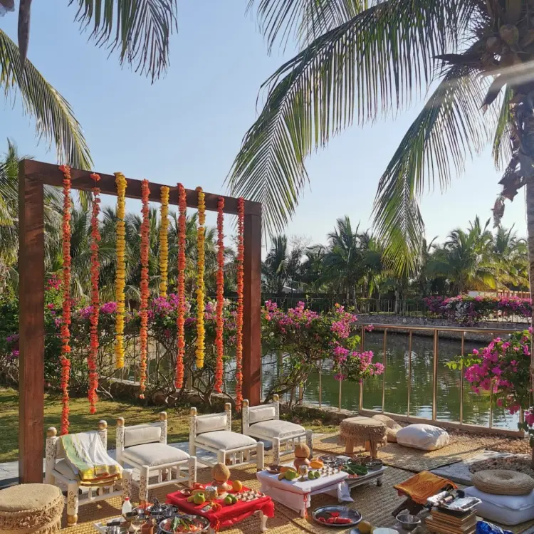South Asian wedding ceremony setup on the garden terrace at El Dorado Casitas Royale, Riviera Maya