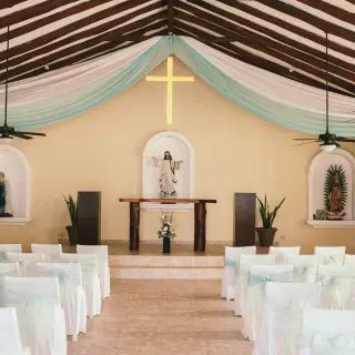 Indoor chapel wedding ceremony at El Dorado Maroma, Riviera Maya