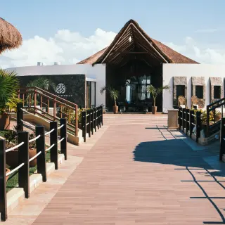 El Dorado Maroma walkway and thatched-roof bungalow suites, Riviera Maya