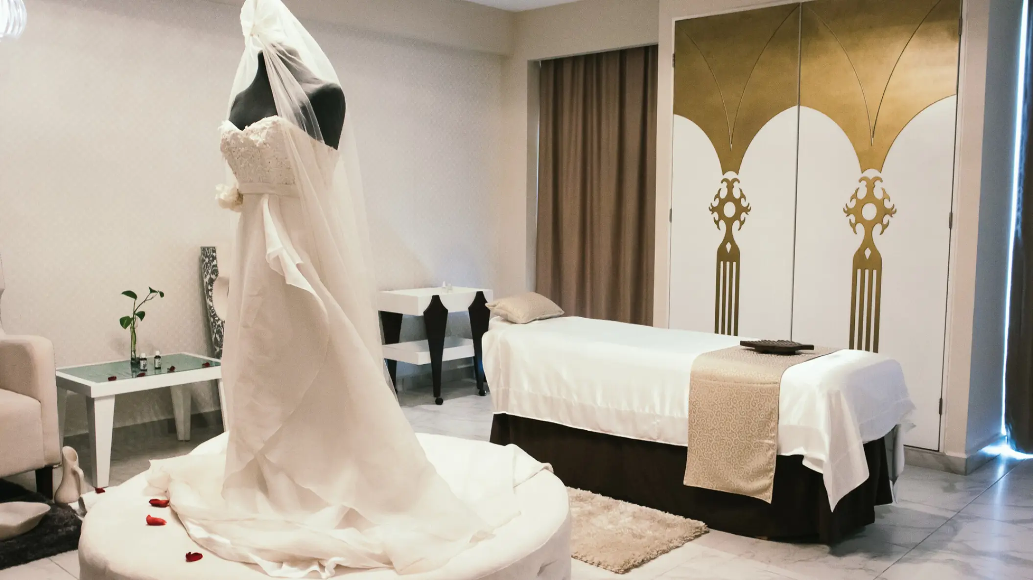 Wedding dress on a mannequin in the bridal spa suite at El Dorado Maroma, Riviera Maya