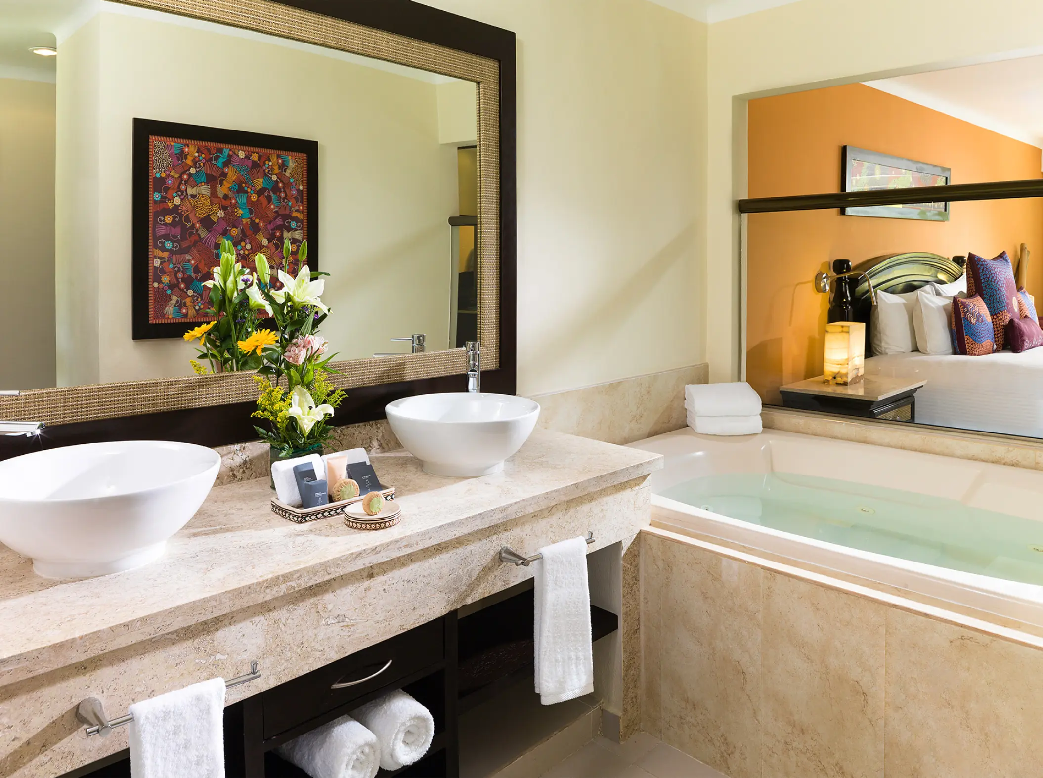 Suite bathroom with double sinks and whirlpool tub at El Dorado Royale, Riviera Maya