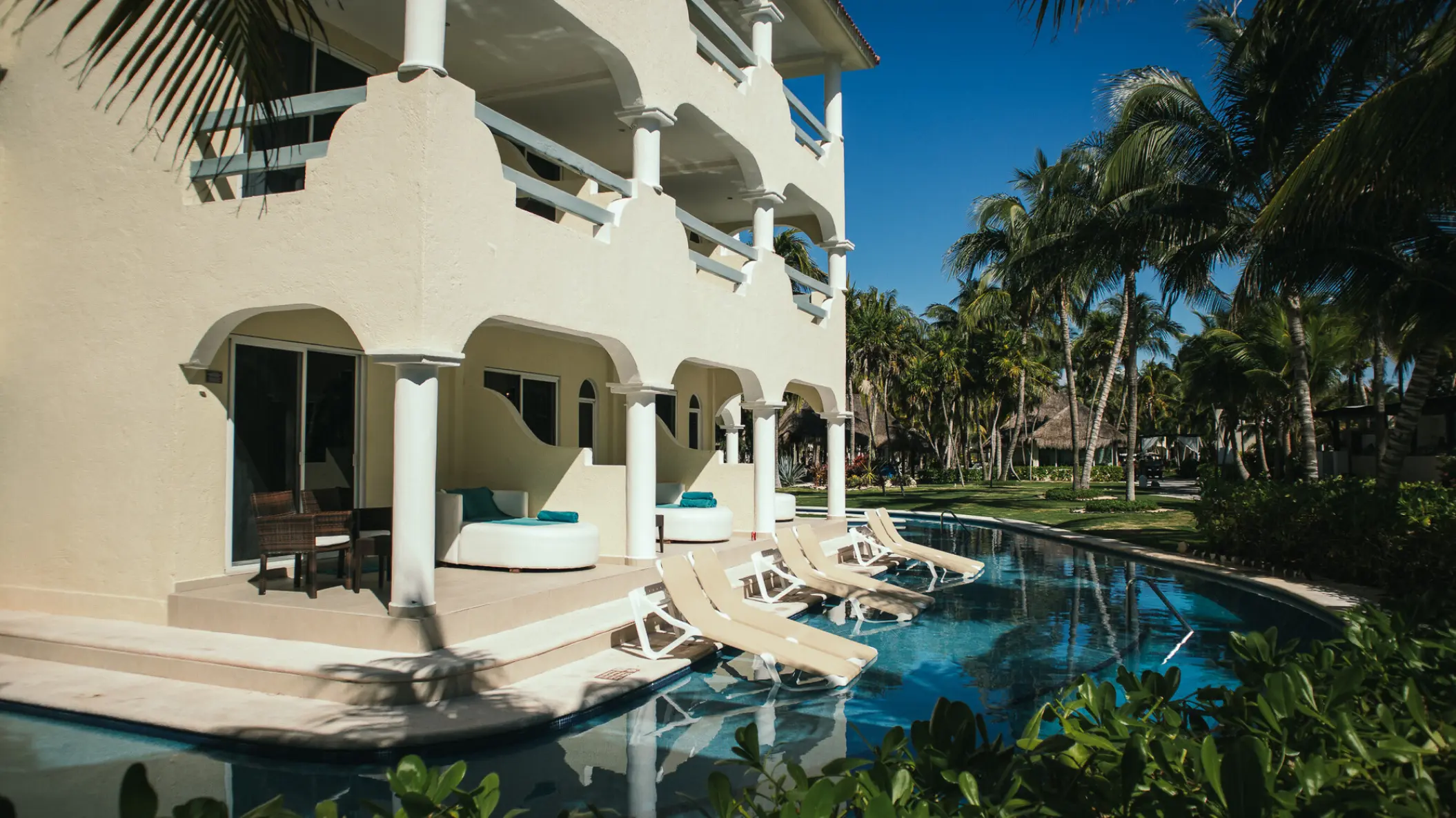Swim-out suites with loungers and terrace at El Dorado Royale, Riviera Maya