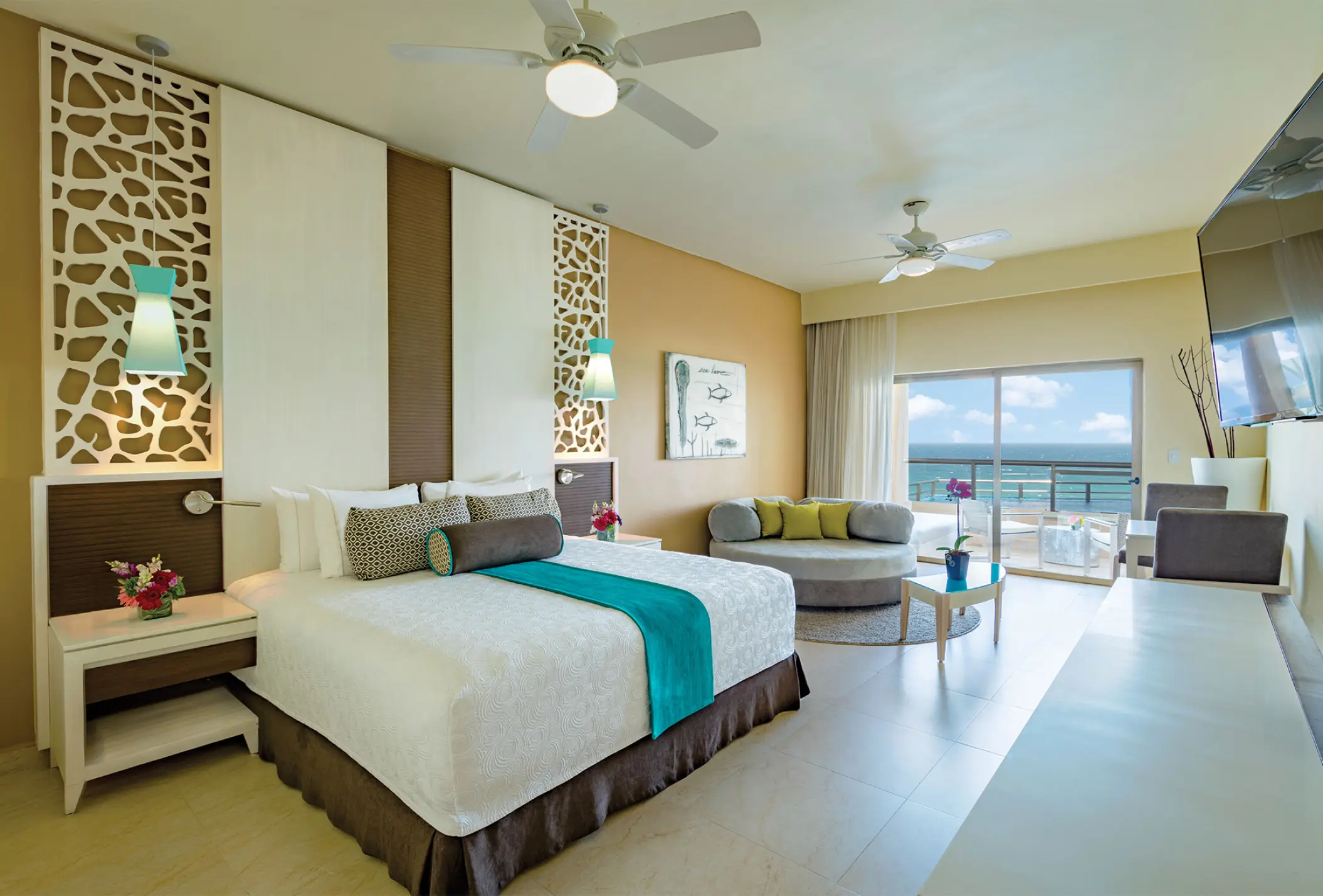 Modern ocean view bedroom with a private balcony at El Dorado Seaside Suites, Riviera Maya
