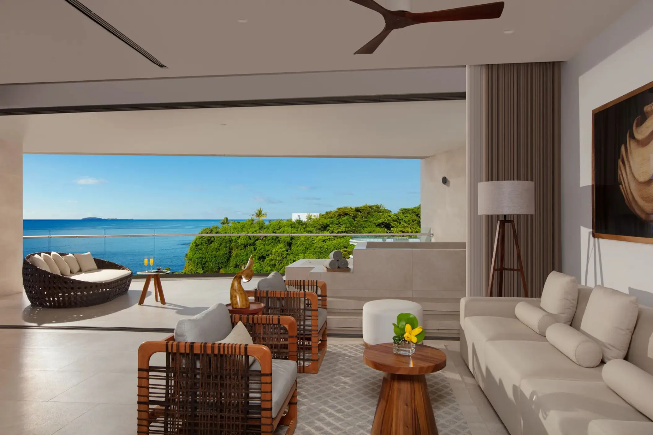 Living area and balcony with ocean views at Secrets Bahia Mita, Puerto Vallarta