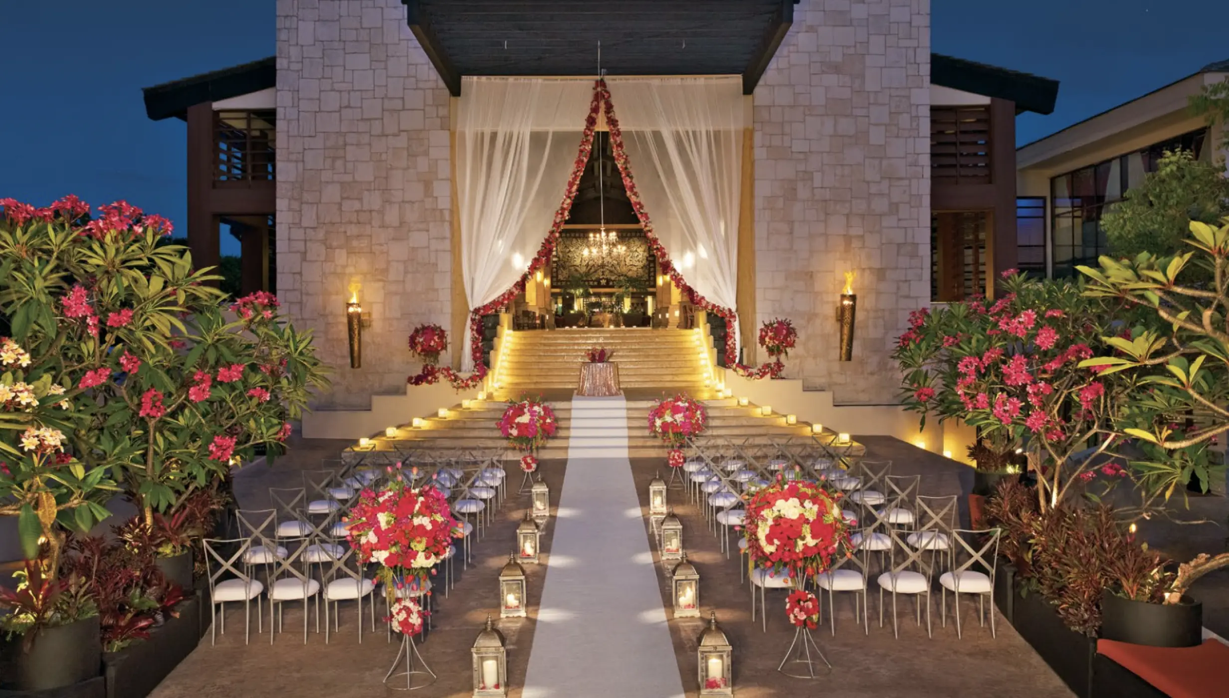Grand lobby staircase wedding ceremony at Dreams Riviera Cancun, Riviera Maya