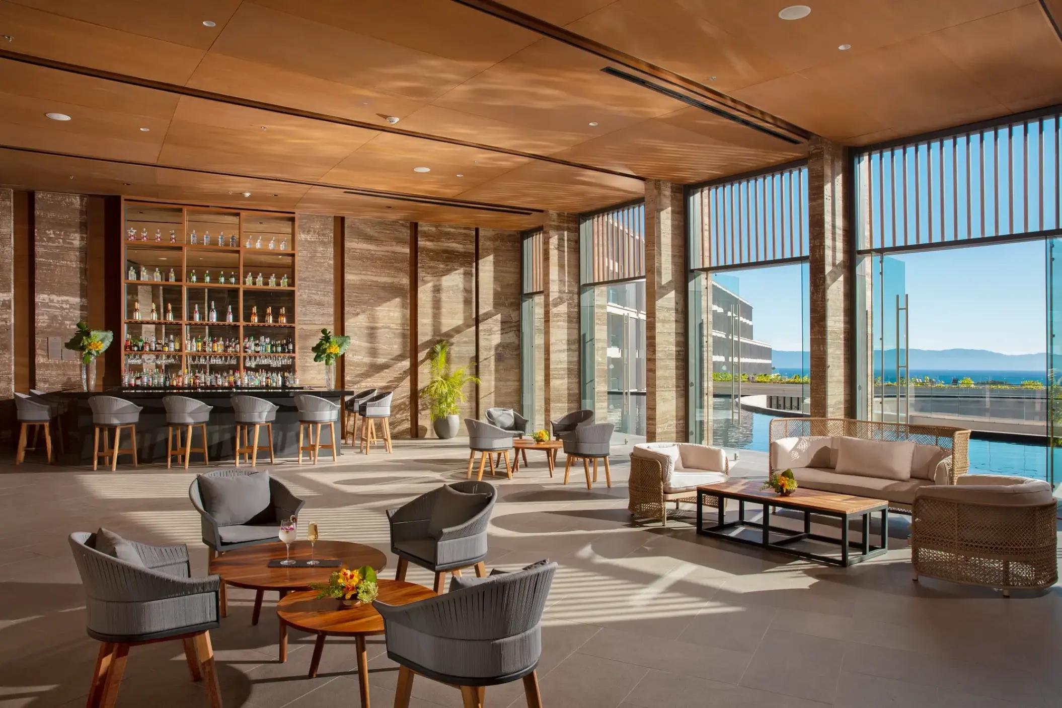 Modern open-air lounge and cocktail bar at Dreams Bahia Mita, Puerto Vallarta