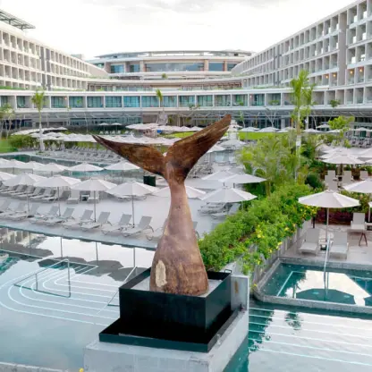 Whale tail sculpture and pool deck at Dreams Bahia Mita, Puerto Vallarta