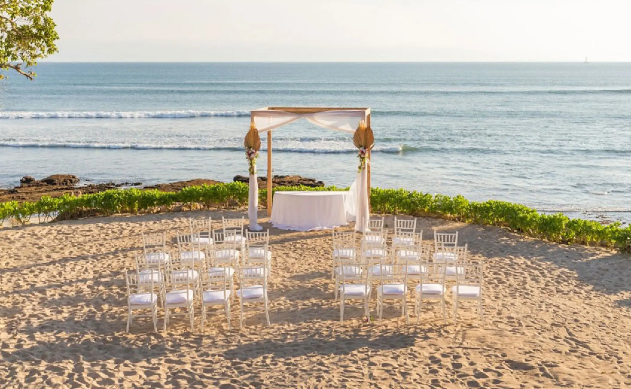 Beachfront wedding ceremony setup at Secrets Bahia Mita, Puerto Vallarta