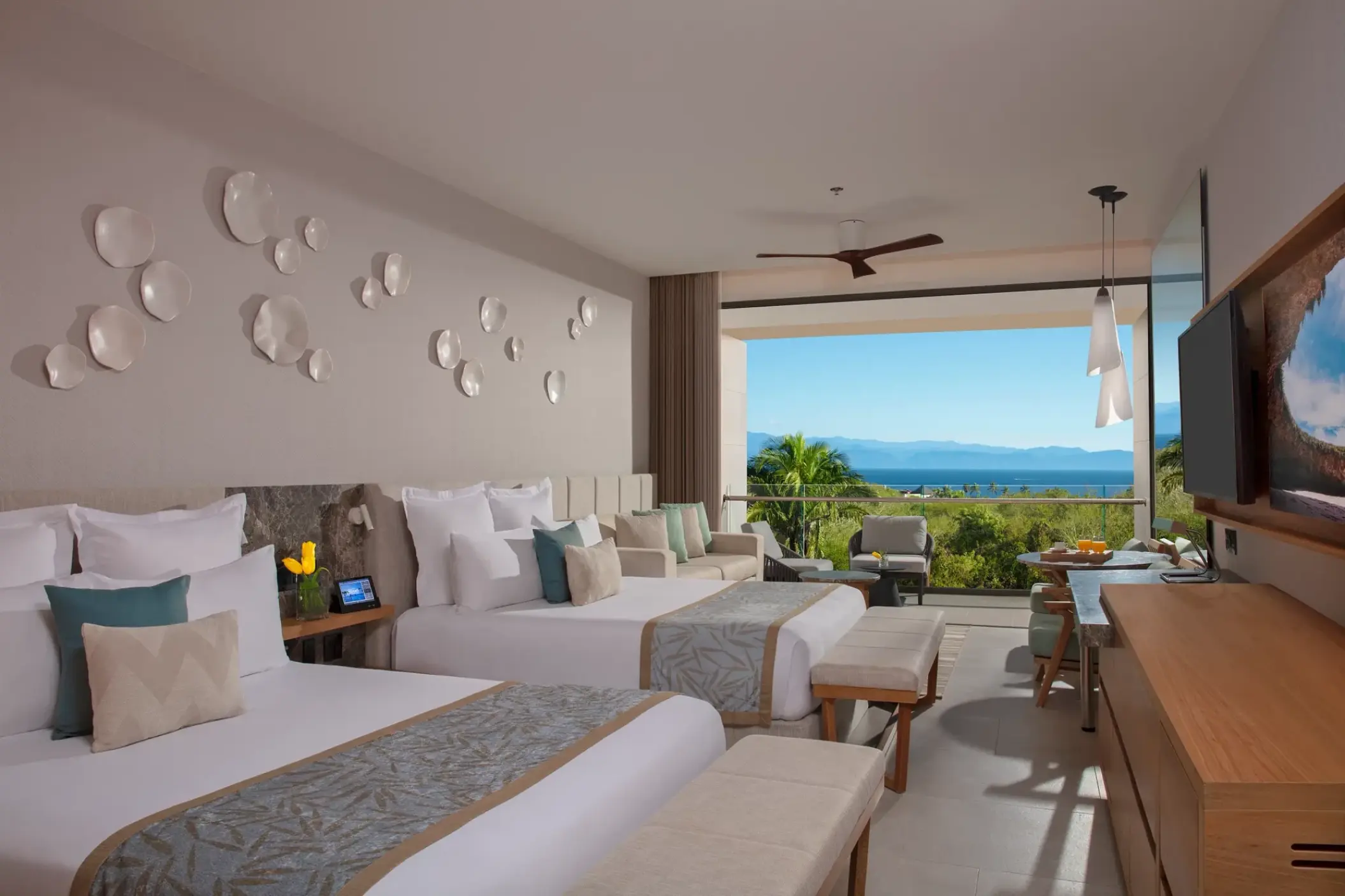 Modern suite with two beds and private balcony at Dreams Bahia Mita, Puerto Vallarta