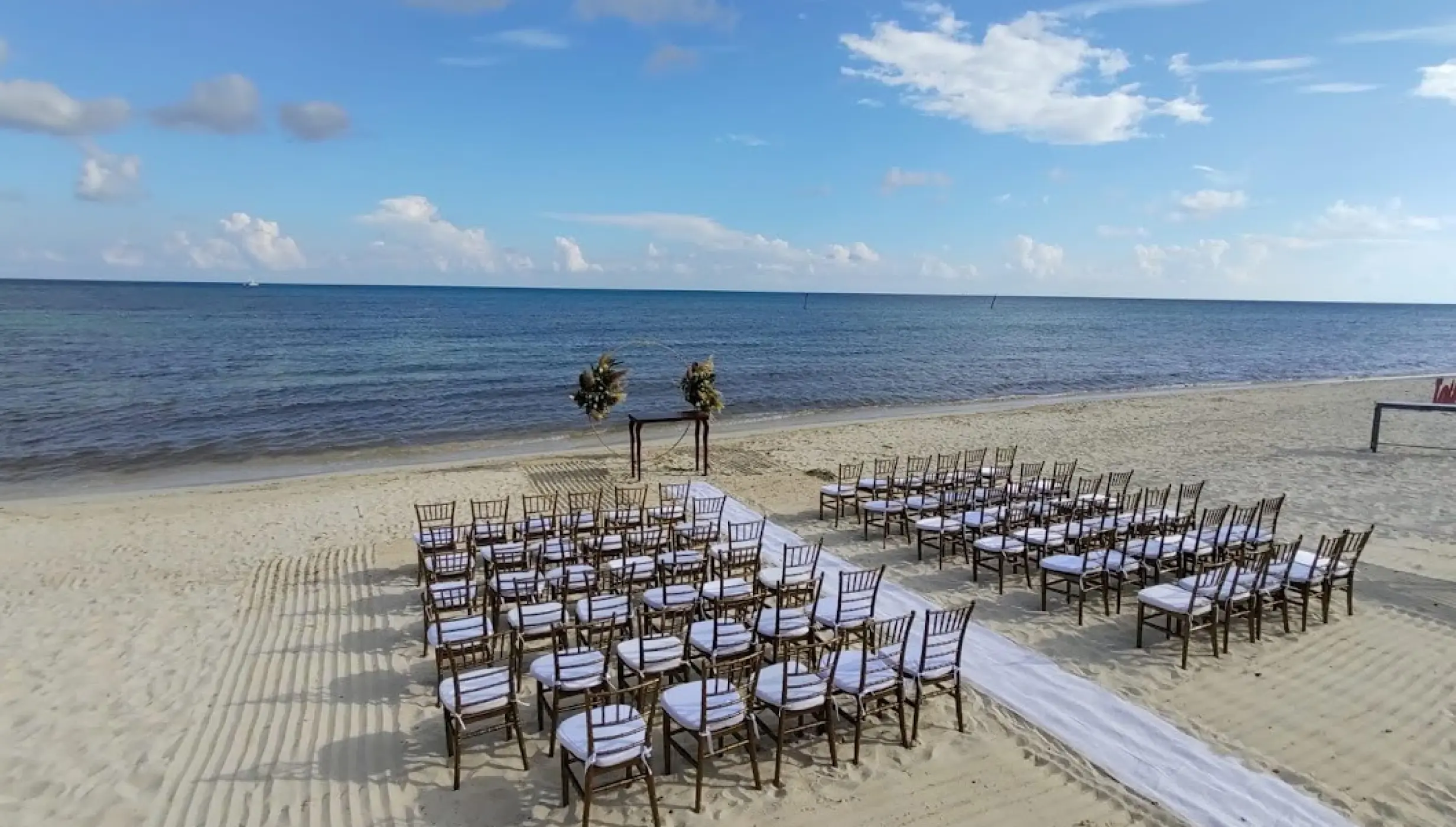 Ceremony decor on the beach at Dreams Jade Resort and Spa
