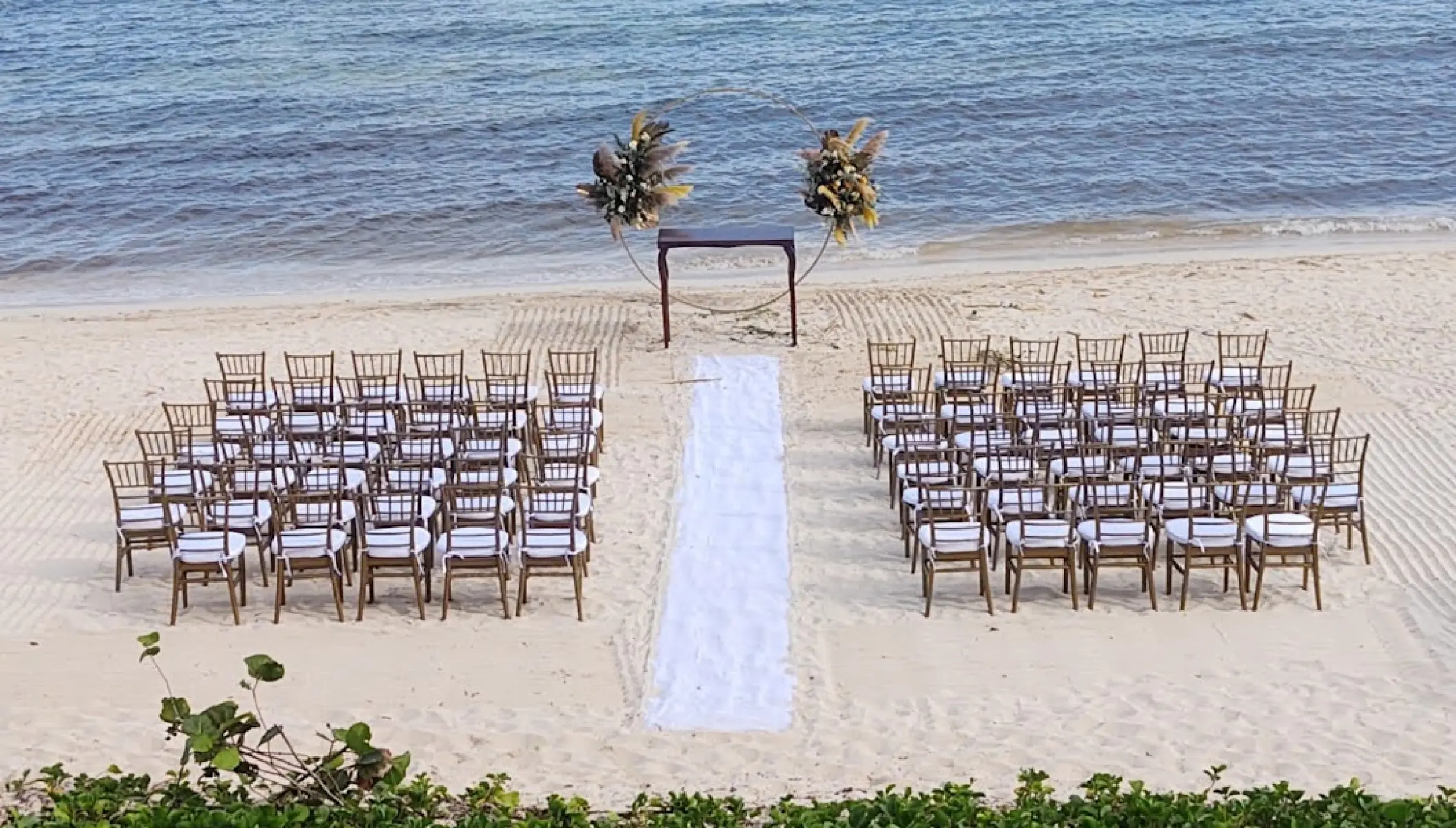 Ceremony decor on the beach at Dreams Jade Resort and Spa