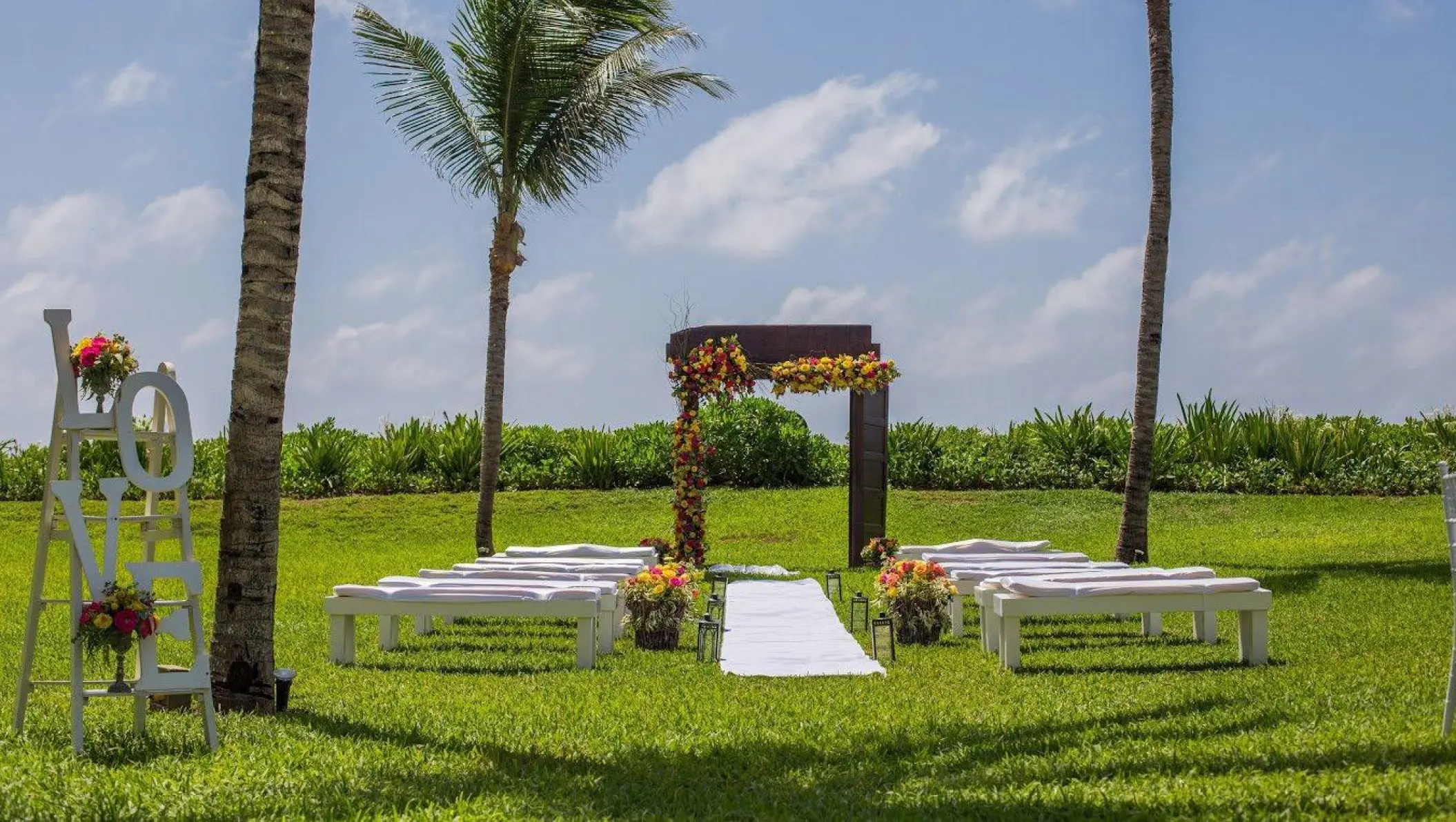 Garden wedding ceremony setup at Dreams Jade, Riviera Maya