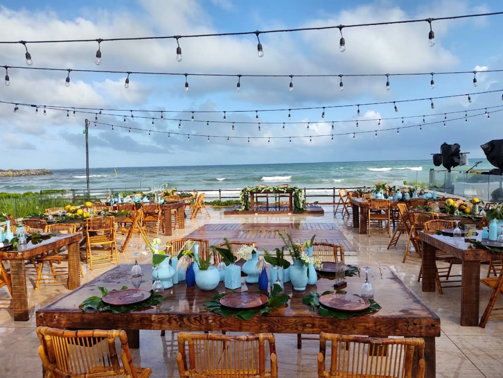 Outdoor wedding reception with string lights at Dreams Jade, Riviera Maya