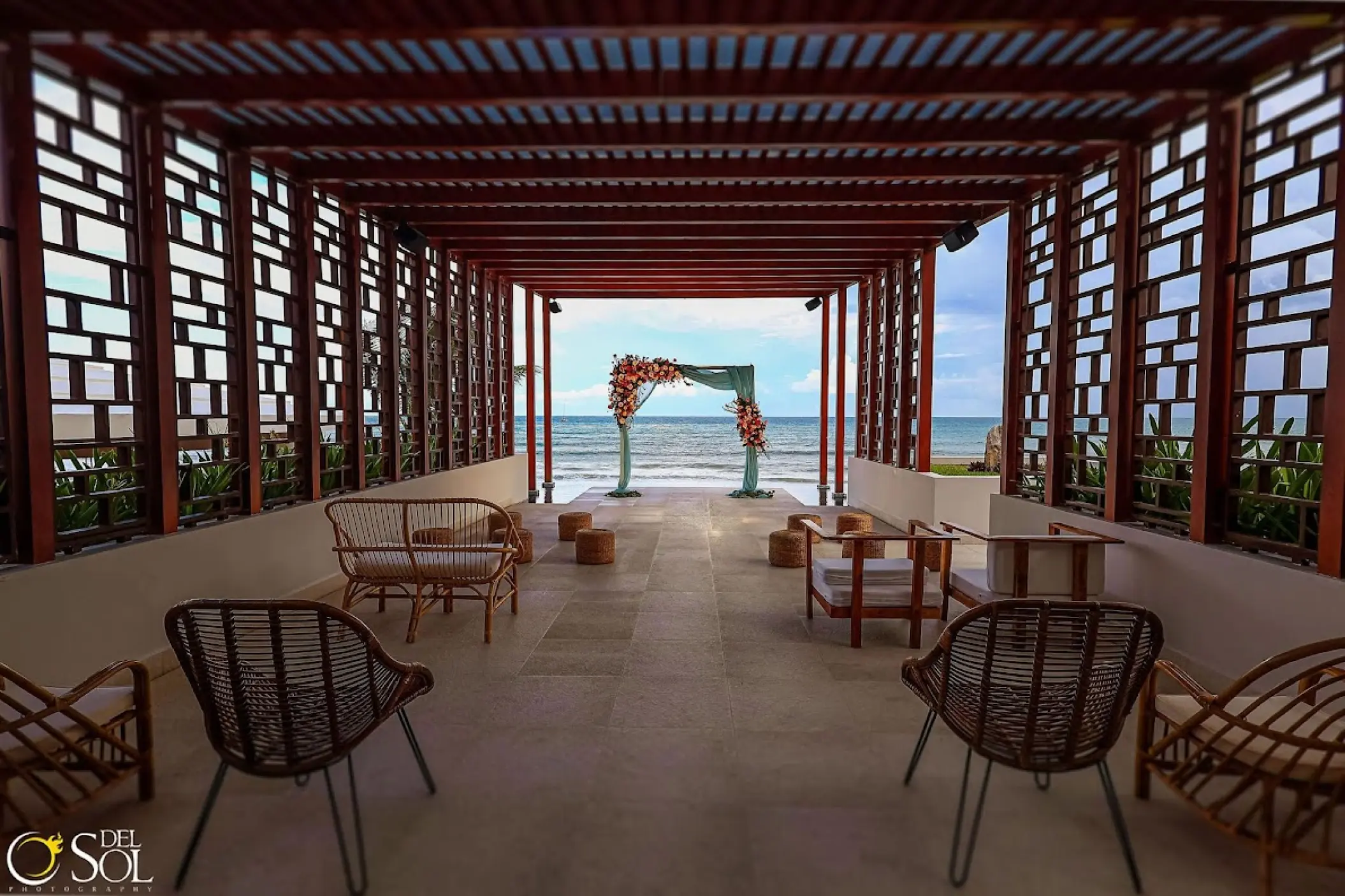 Pergola deck wedding ceremony venue overlooking the ocean at Dreams Jade, Riviera Maya