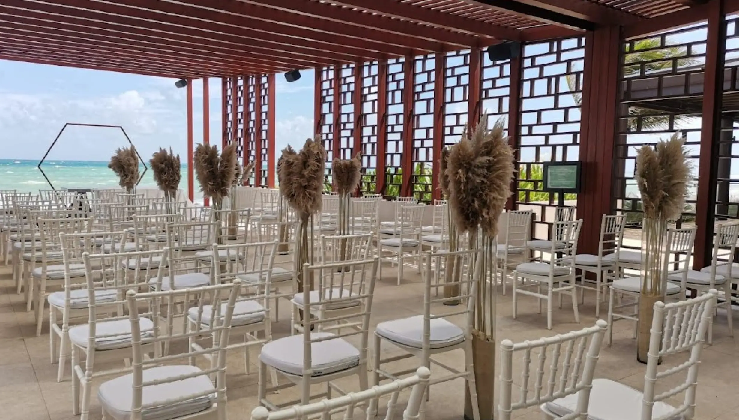 Ceremony decor on the beach at Dreams jade resort and spa