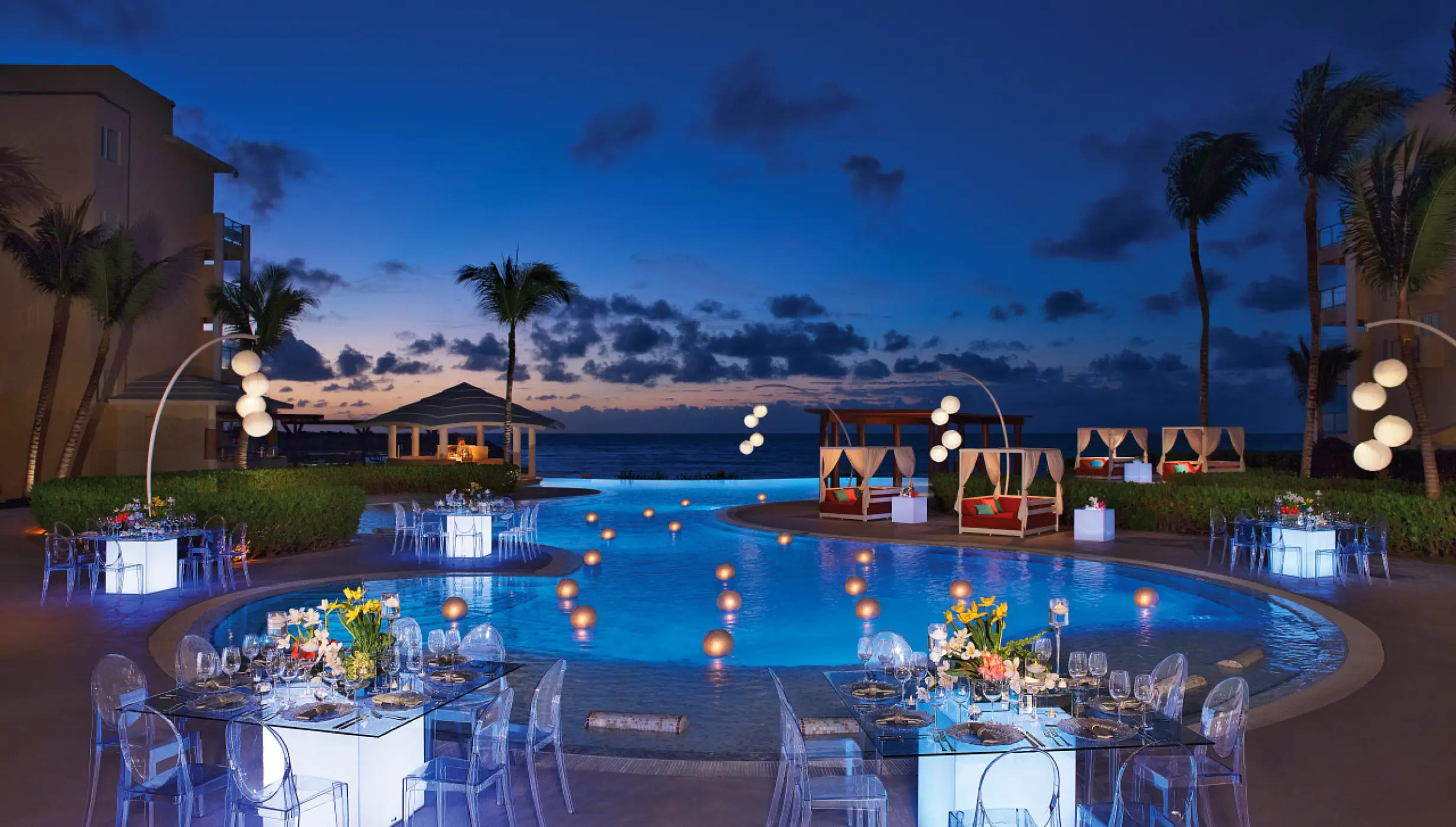 Dinner reception in pool area at Dreams Jade Resort and Spa