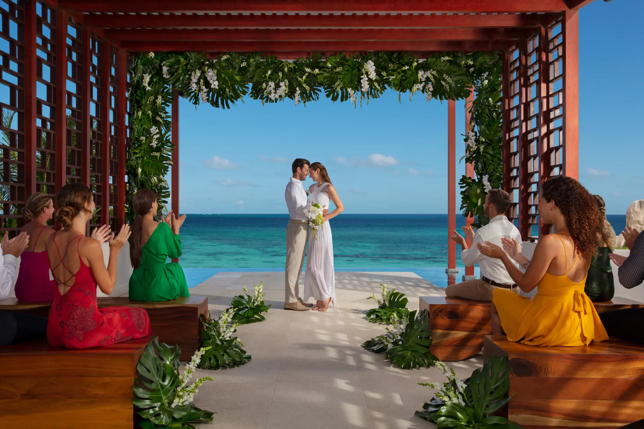 Wedding ceremony at the oceanfront pergola at Dreams Jade, Riviera Maya
