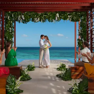 Wedding ceremony at the oceanfront pergola at Dreams Jade, Riviera Maya