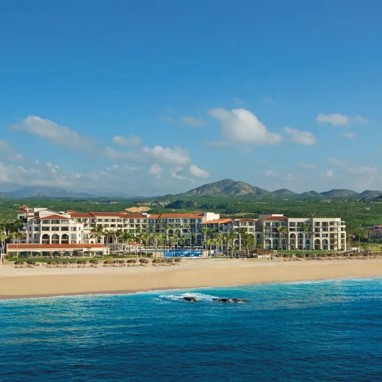 Aerial view of Dreams Los Cabos beachfront property and blue ocean, Cabo San Lucas
