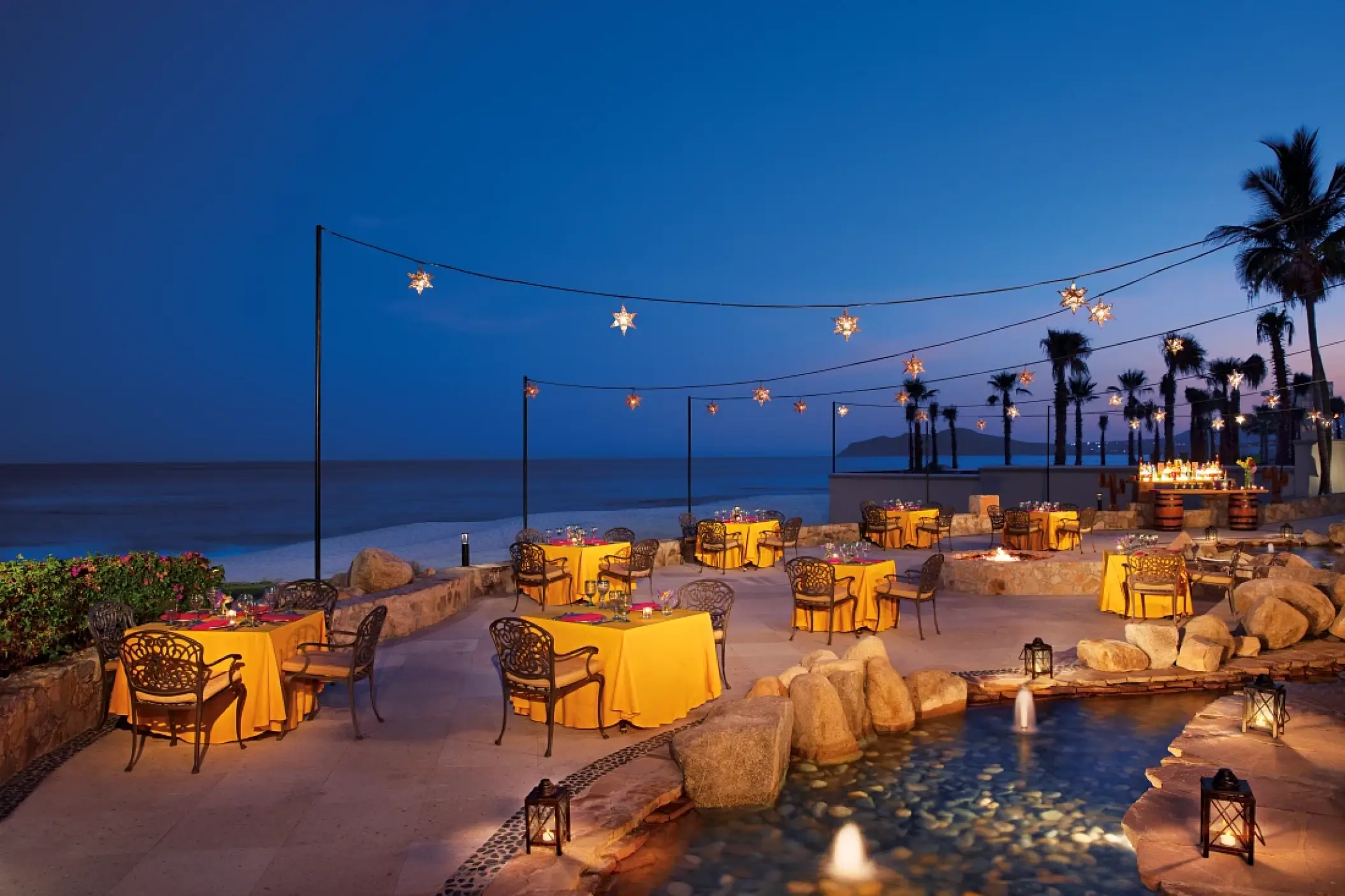 Evening terrace dining at Dreams Los Cabos overlooking the ocean, Cabo San Lucas