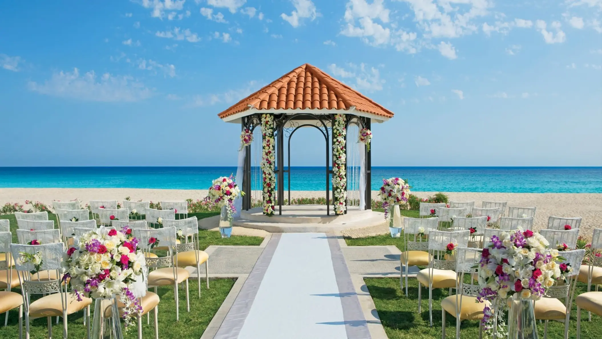 Beachfront wedding ceremony gazebo at Dreams Los Cabos, Cabo San Lucas