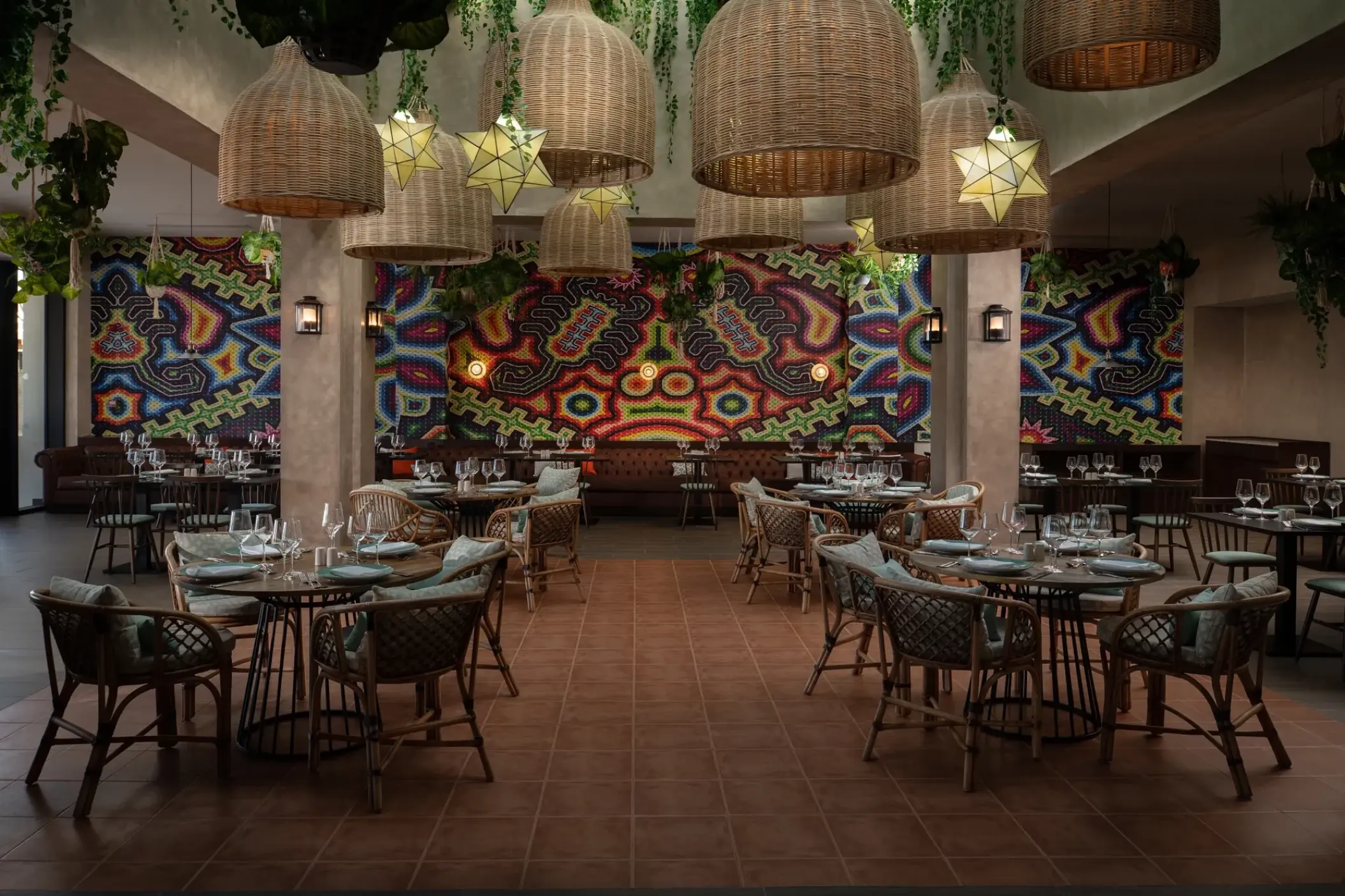 El Patio restaurant with wicker lanterns and colorful murals at Dreams Macao Beach, Punta Cana