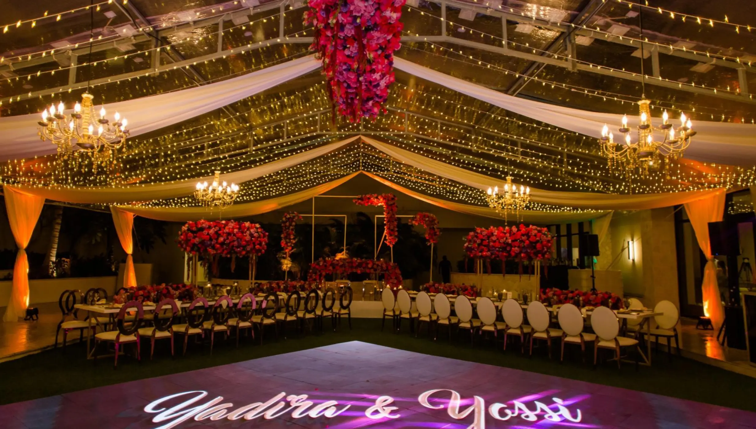 Wedding reception at Dreams Natura, Riviera Maya with Yadira and Yossi monogram on the dance floor