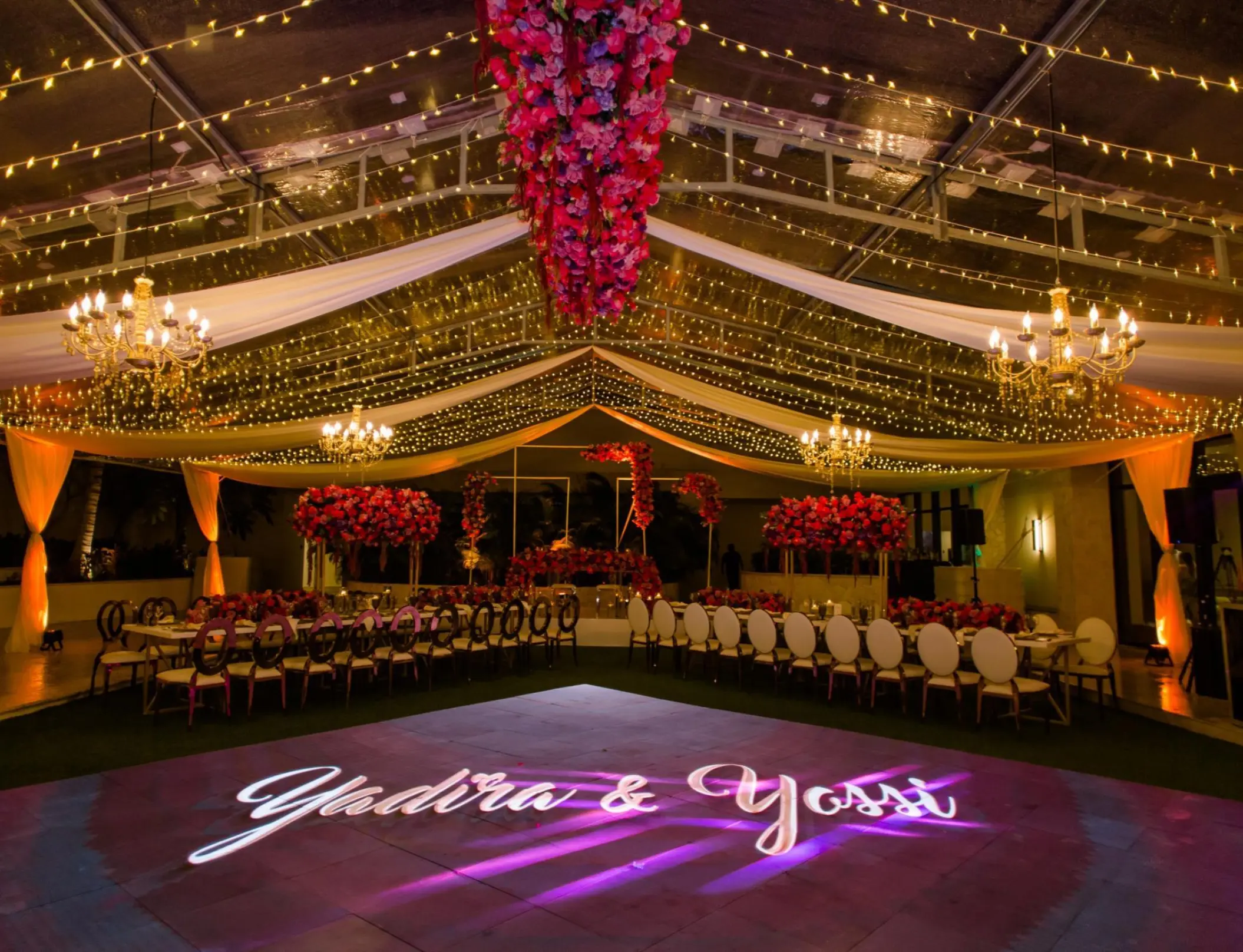 Wedding reception at Dreams Natura, Riviera Maya with Yadira and Yossi monogram on the dance floor