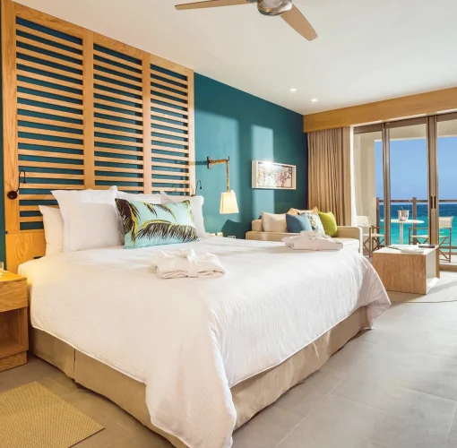 beachfront room king bed at Dreams Natura Resort and spa