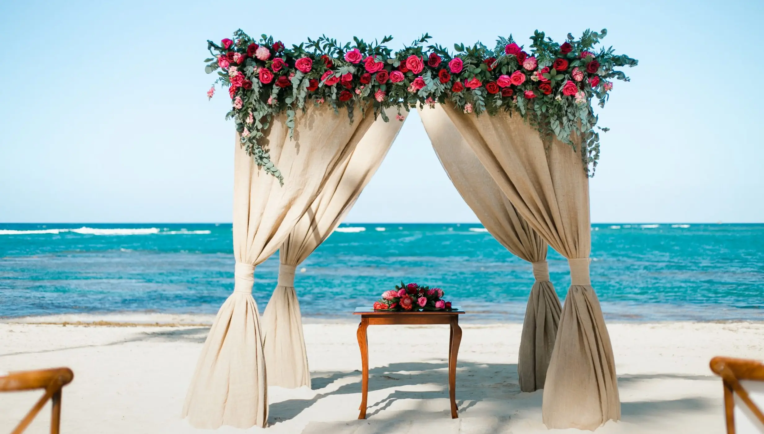 Ceremony decor on the beach at Dreams Onyx Resort & Spa