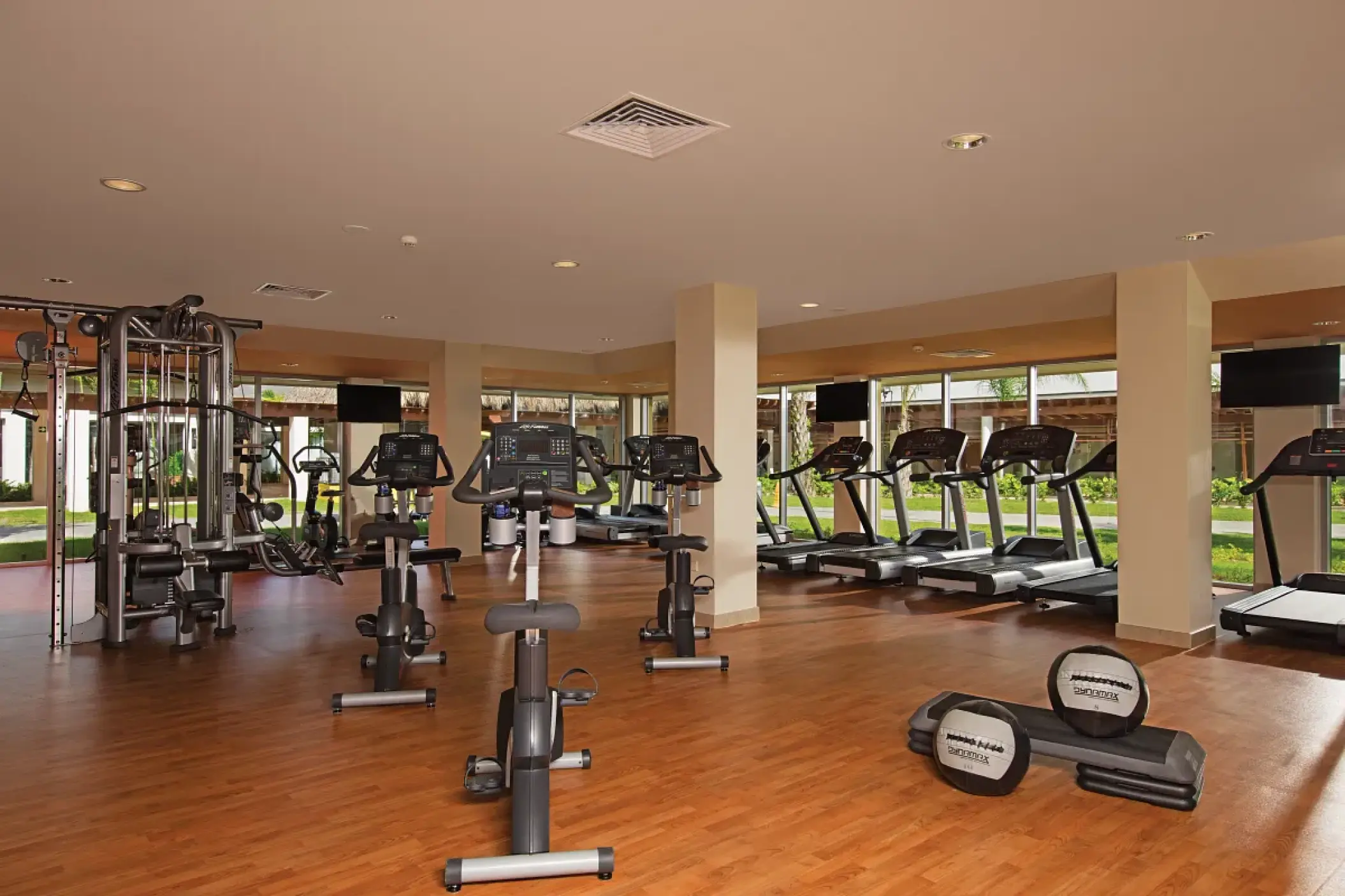 Dreams Onyx fitness center with treadmills, stationary bikes, and weight machines, Punta Cana