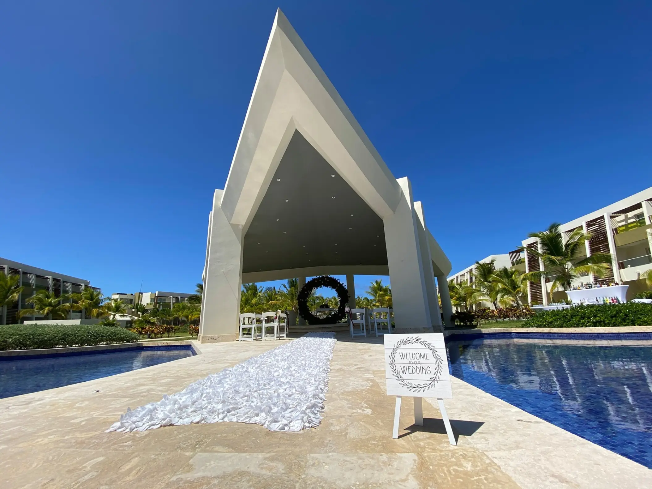 Modern fountain gazebo wedding ceremony setup at Dreams Onyx, Punta Cana