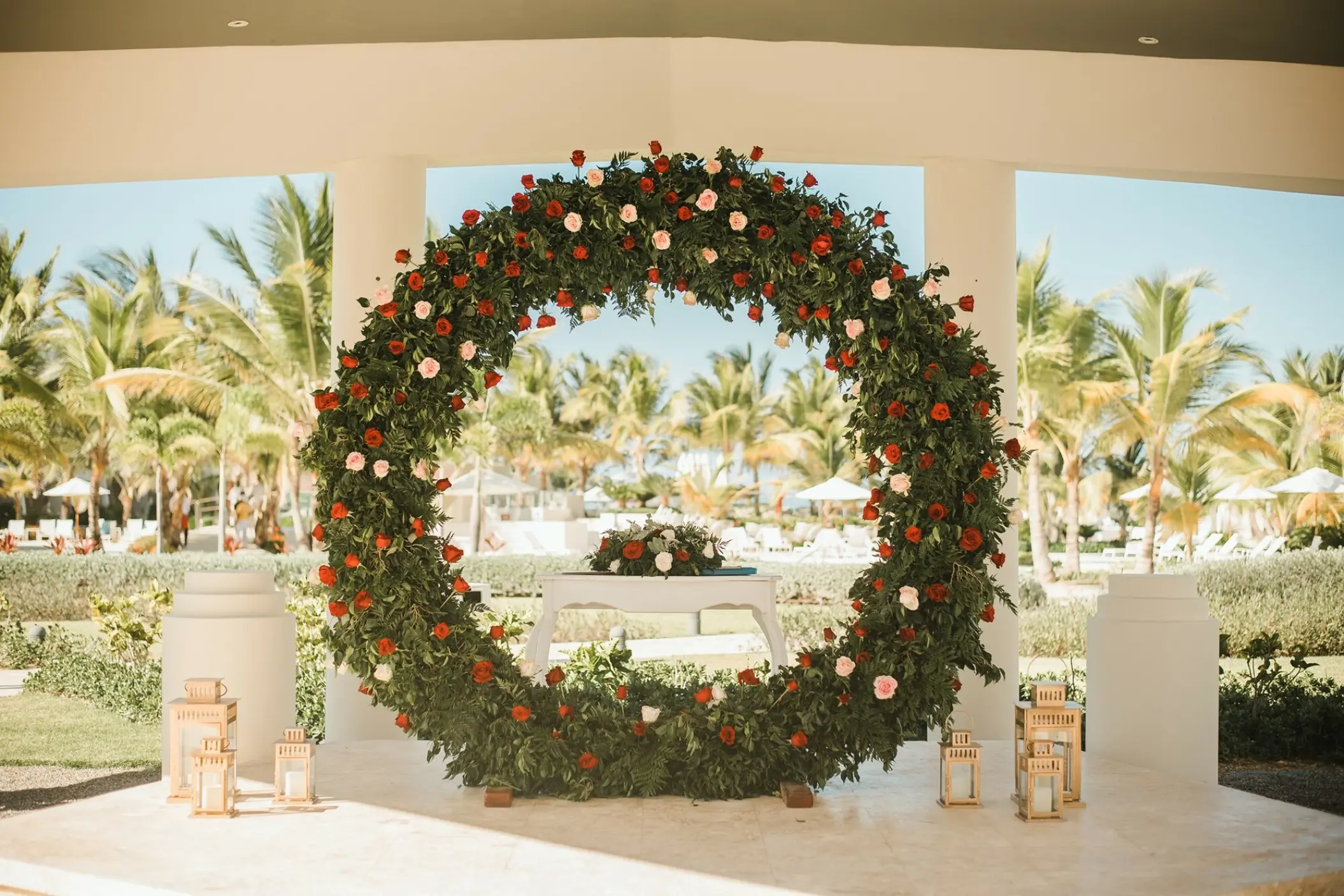 Circular floral wedding ceremony arch at Dreams Onyx, Punta Cana