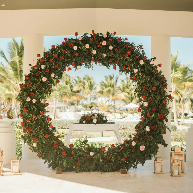 Circular floral wedding ceremony arch at Dreams Onyx, Punta Cana