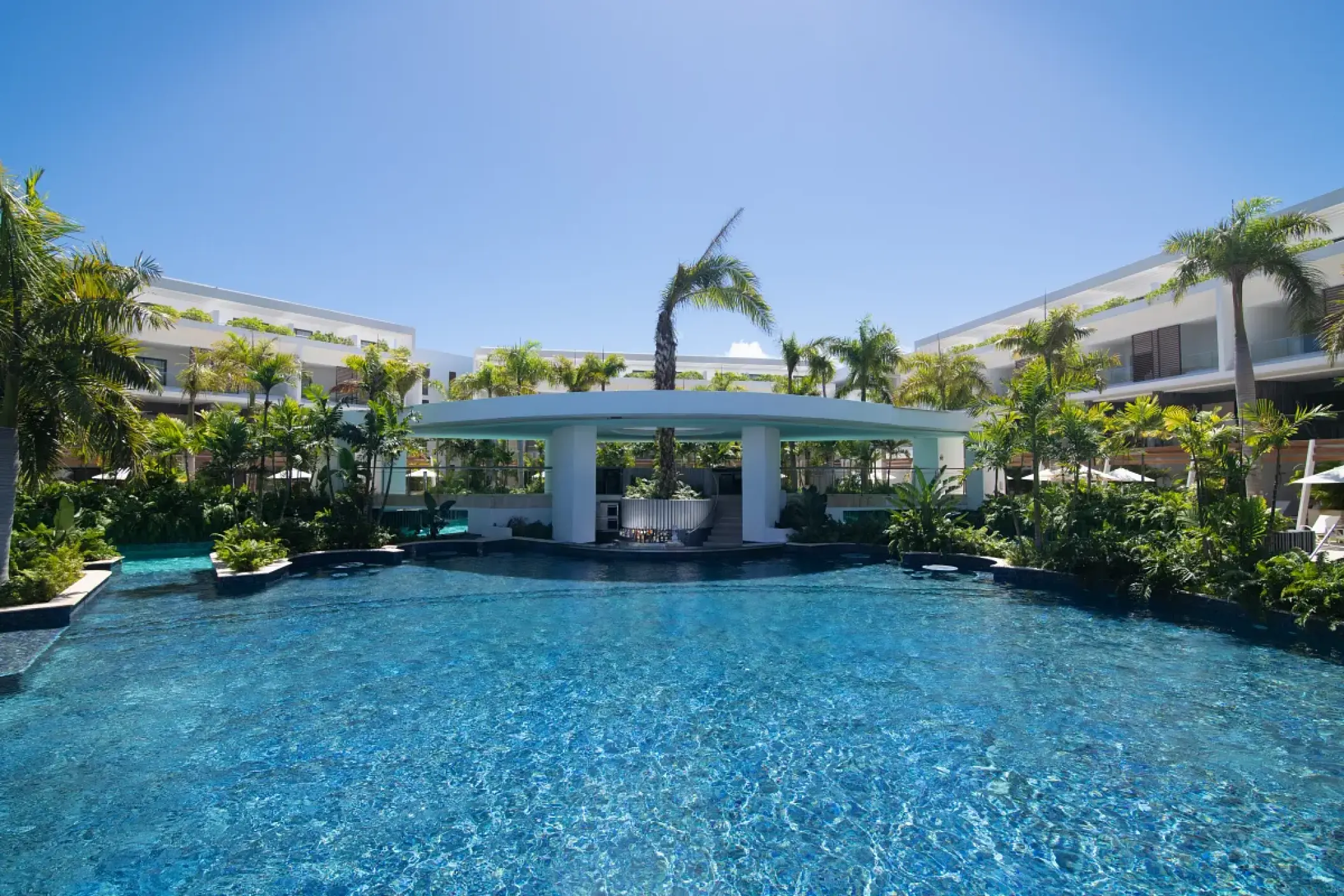 Swim-up bar and jungle water park pool at Dreams Onyx, Punta Cana