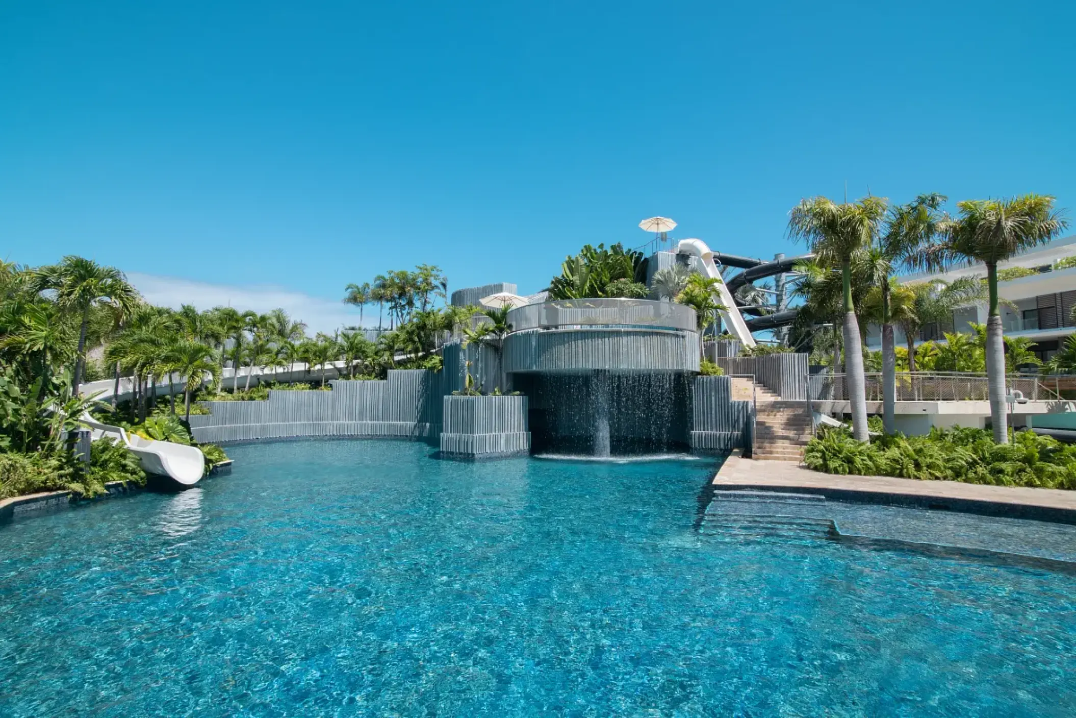 Jungle water park and swimming pool with slides at Dreams Onyx, Punta Cana
