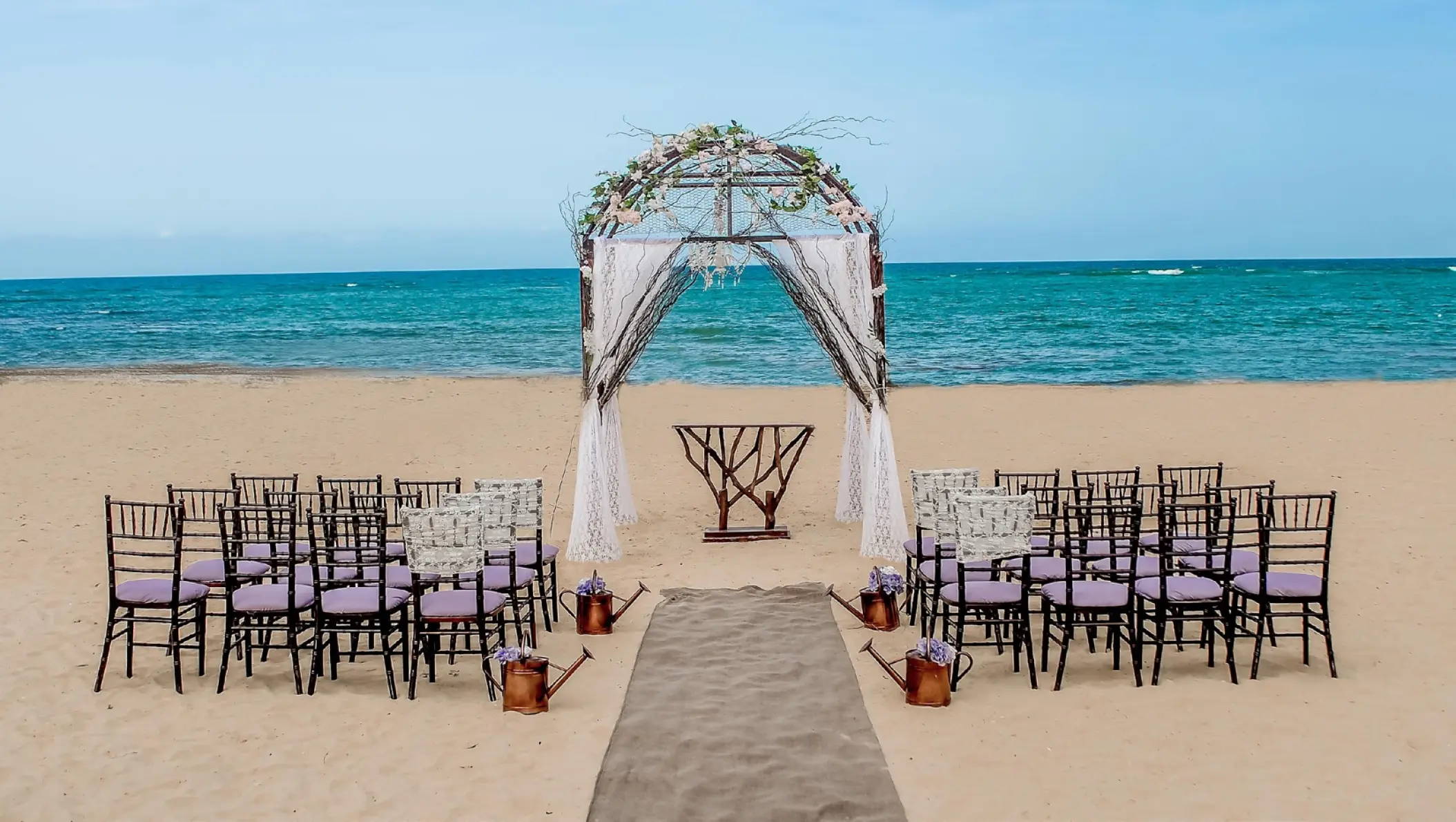 Beachfront wedding ceremony setup at Dreams Onyx, Punta Cana