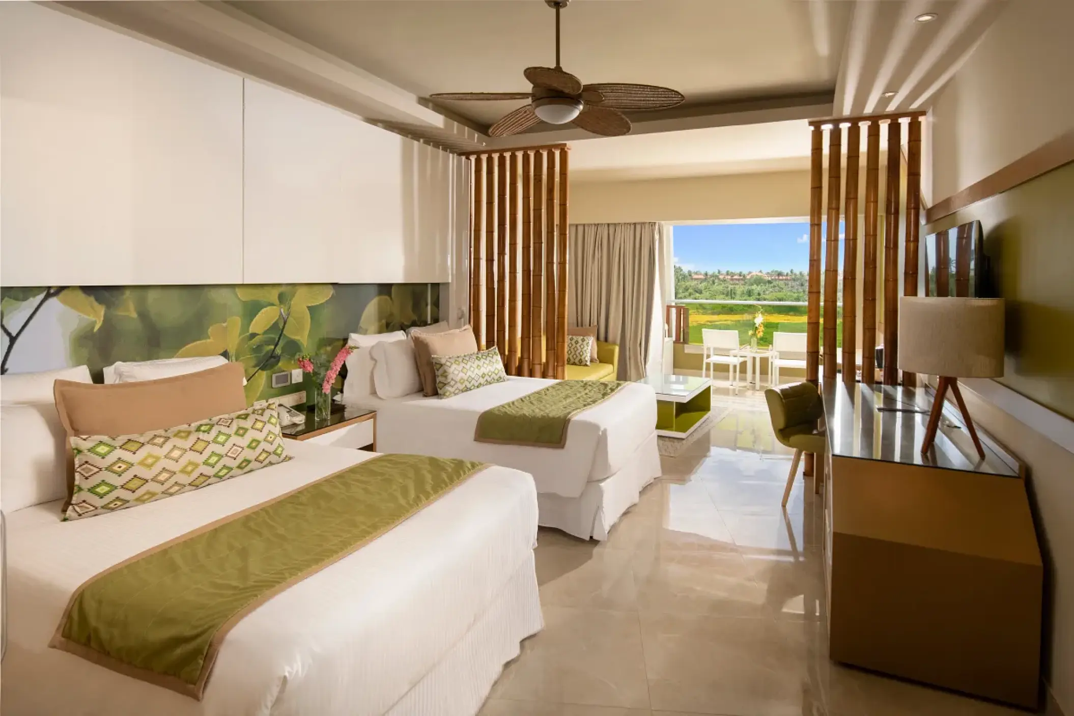 Modern suite with two beds and a balcony at Dreams Onyx, Punta Cana