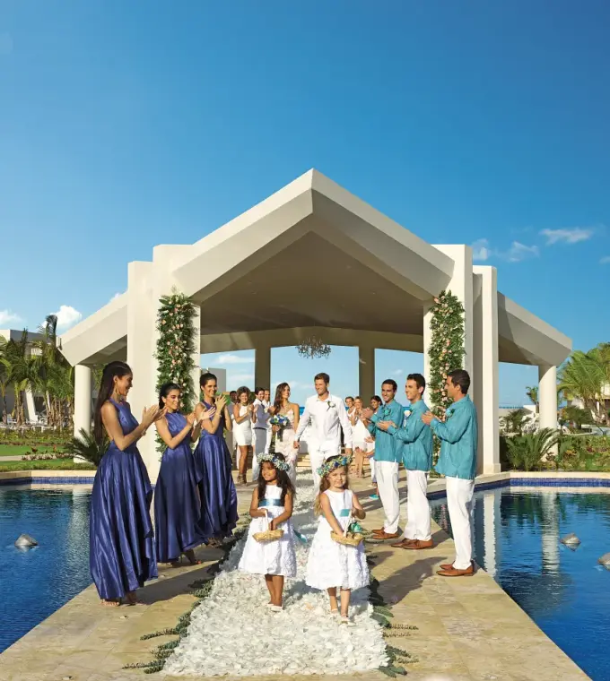Wedding party walking down the aisle at the Dreams Onyx wedding gazebo, Punta Cana