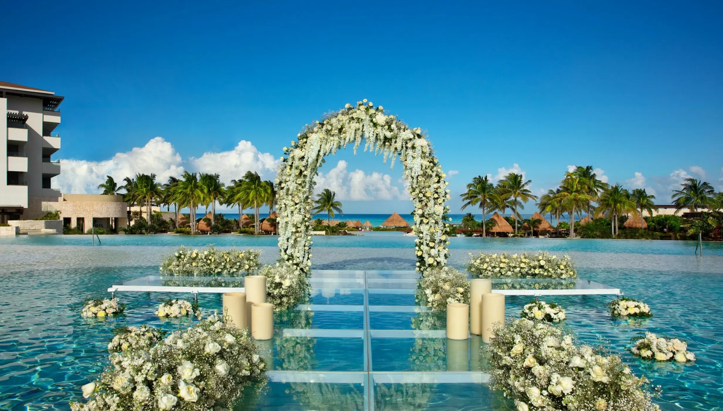 Weddings altar pool at Dreams Playa Mujeres golf and spa