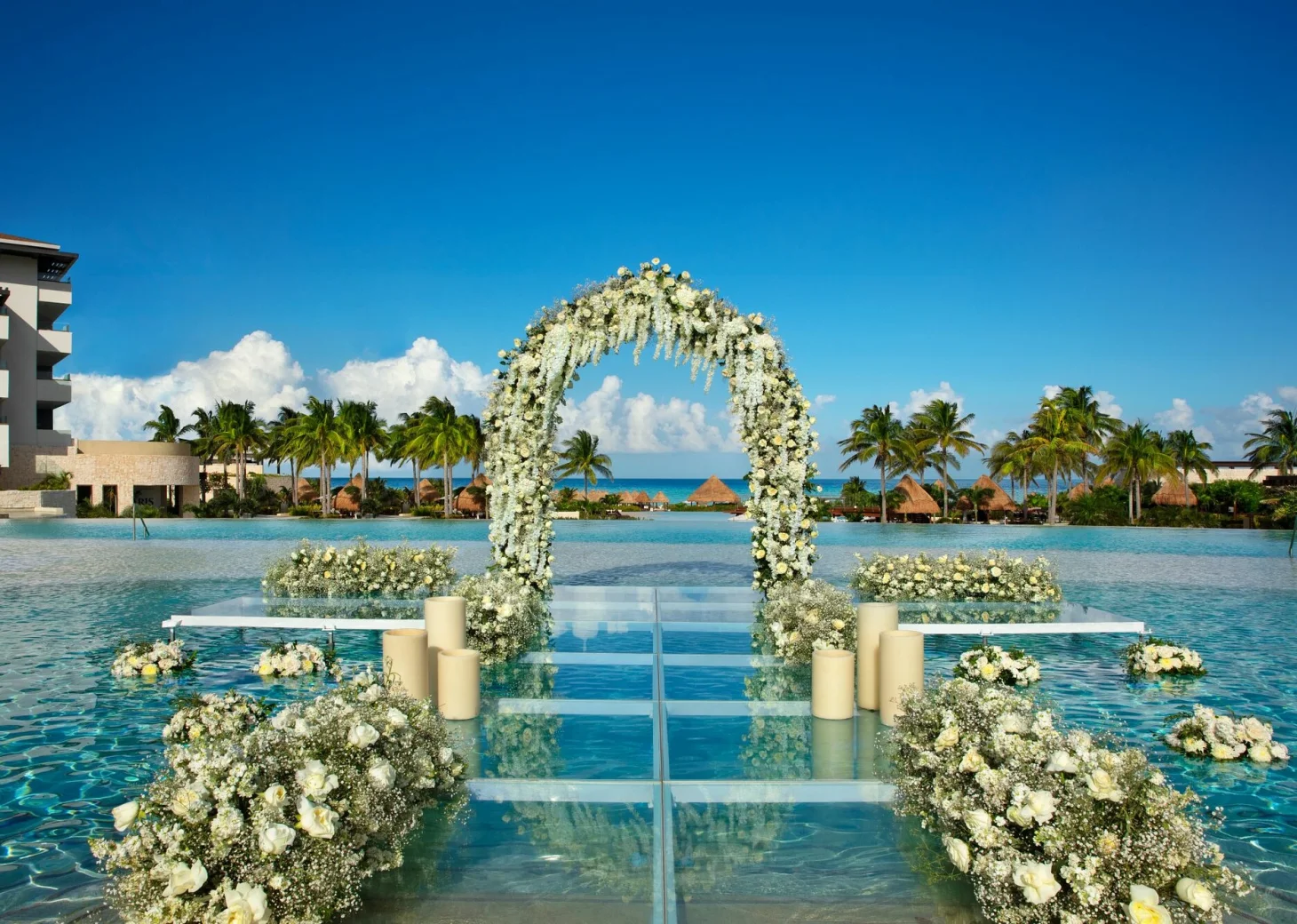 Weddings altar pool at Dreams Playa Mujeres golf and spa